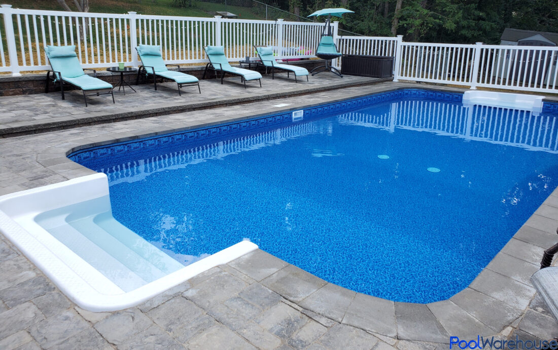 In-Ground Swimming Pool with White Steps